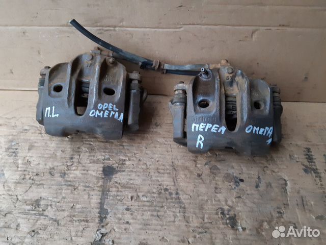 Суппорт передний Опель Омега А