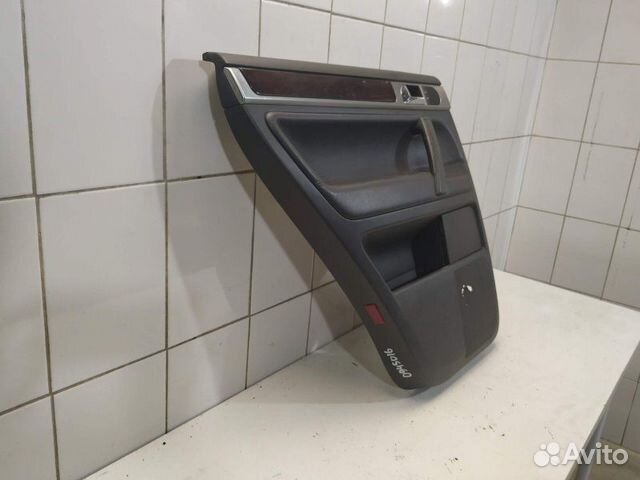 Обшивка задняя левая 7L6867211AG VW Touareg 2002-2 Обшивка задняя левая 7L6867211AG VW Touareg 2002-2