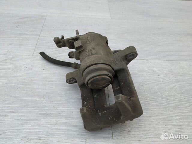 Суппорт задний левый 1K0615423J Skoda Octavia (A5 Суппорт задний левый 1K0615423J Skoda Octavia (A5