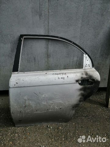 Дверь задняя левая Kia Spectra, б/у серебро