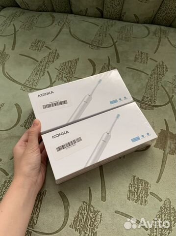 Электрическая зубная щетка