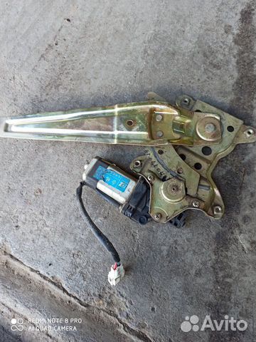 Стекло подъемник передний левый Джили Мк