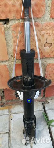 Стойка передняя Renault Duster