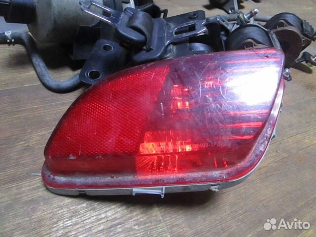 Фонарь противотуманный задний левый KIA Venga