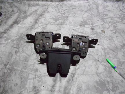 Замок крышки багажника Opel Astra J
