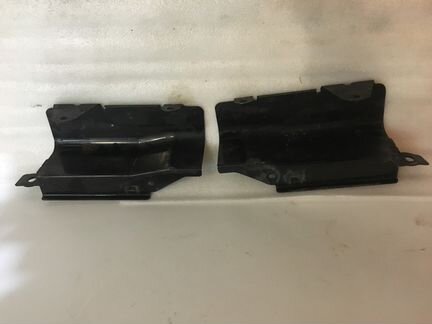 Кронштейн заднего фонаря лев Мазда сх7 EHY050160