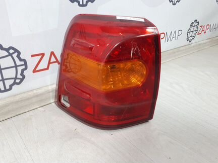 Фонарь левый внешний Toyota Land Cruiser J200