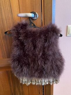 Меховая жилетка